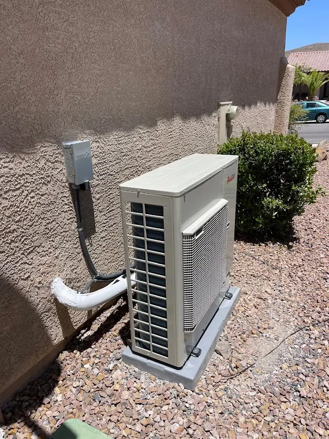 Residential air conditioning condenser unit in Spotswood